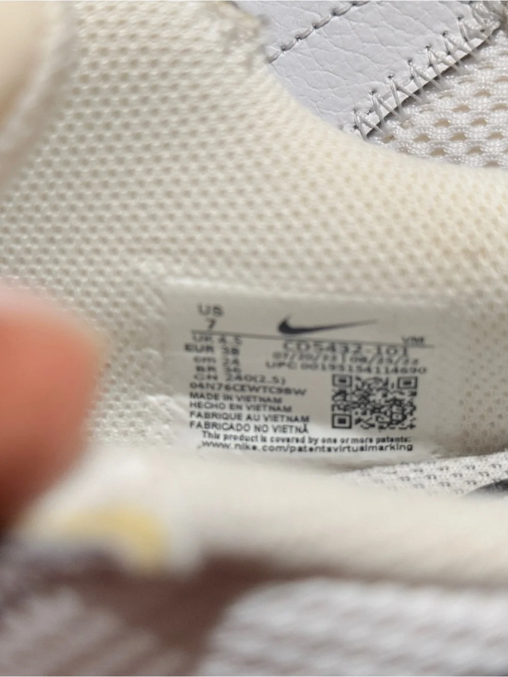 Nike White Sneakers with Black Swoosh
